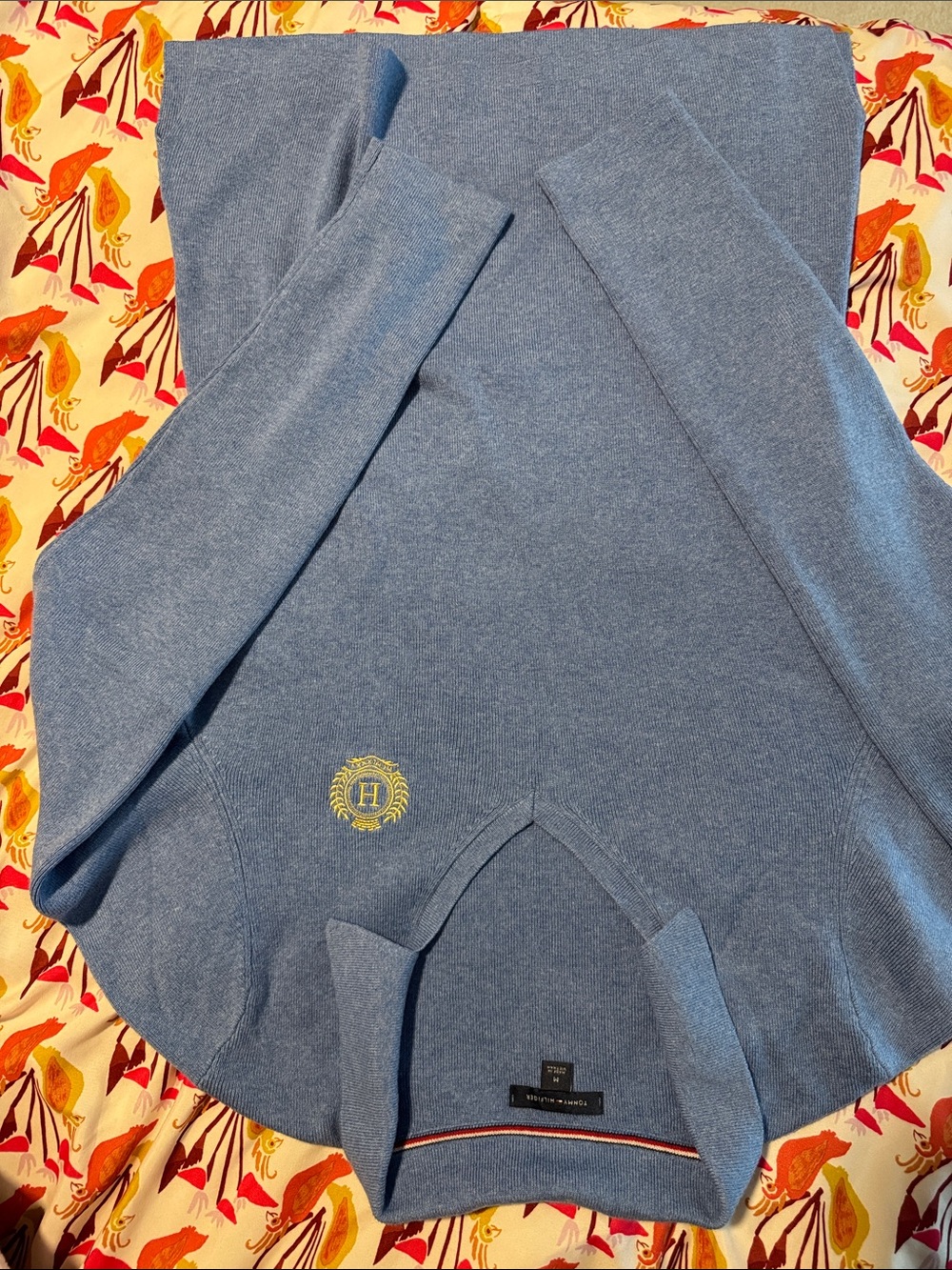 Tommy Hilfiger Light Blue V-Neck Sweater with Gold Crest